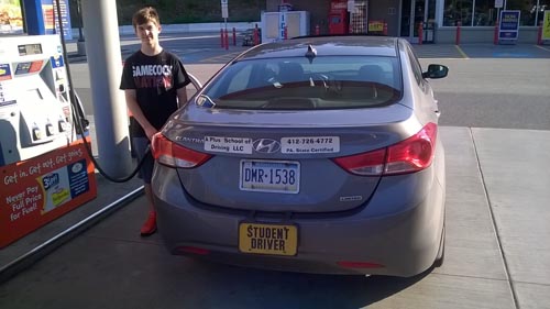 Anthony pumping gas!