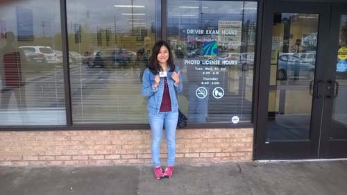 Weiying gets her license with a perfect score