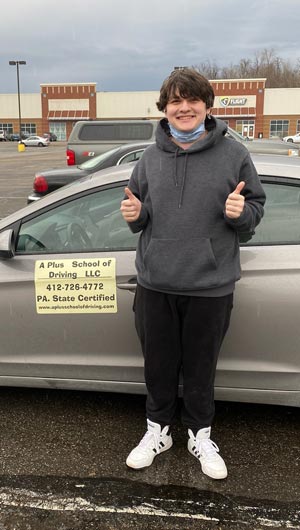 Jack gets his driver's license on his first try with a perfect score!