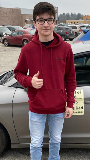 Mason gets his driver's license on his first try with a perfect score!