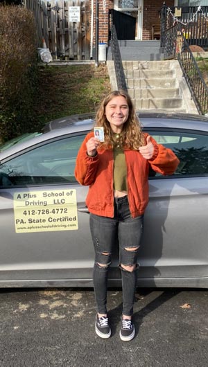 Rachel gets her driver's license on her first try with a perfect score!